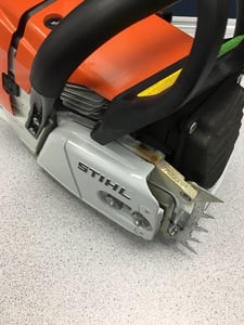 Location of serial number under front hand guard on sprocket side